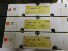 Load image into Gallery viewer, SMC Pneumatic Manifold Air 4 Station With (3) VQ4100-5 Solenoid Valves Used
