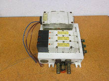 Load image into Gallery viewer, SMC Pneumatic Manifold Air 4 Station With (3) VQ4100-5 Solenoid Valves Used
