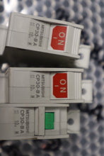 Load image into Gallery viewer, Mitsubishi CP30-BA 10A 220VAC 2.5kA 1-Pole Circuit Protectors Used (Lot of 3)
