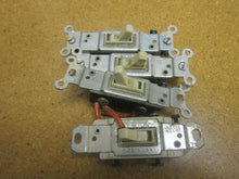Load image into Gallery viewer, Leviton 15A 120VAC Toggle Switches (Lot of 4)
